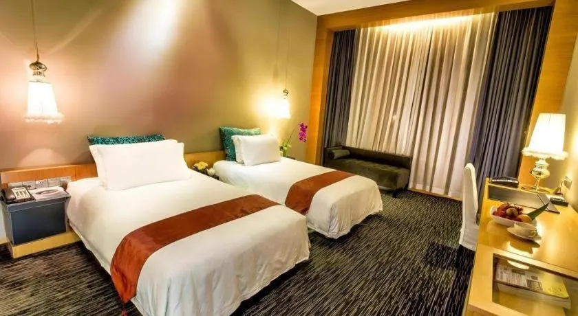 Bed in Guangzhou Carat Hotel