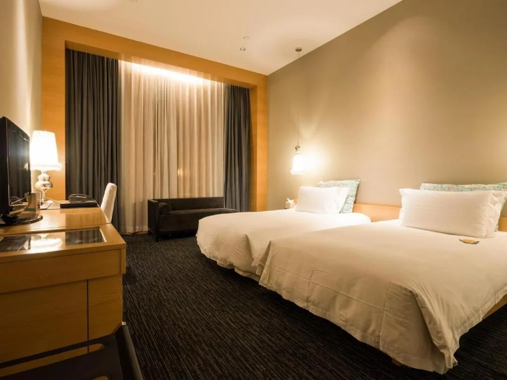 Bed in Guangzhou Carat Hotel