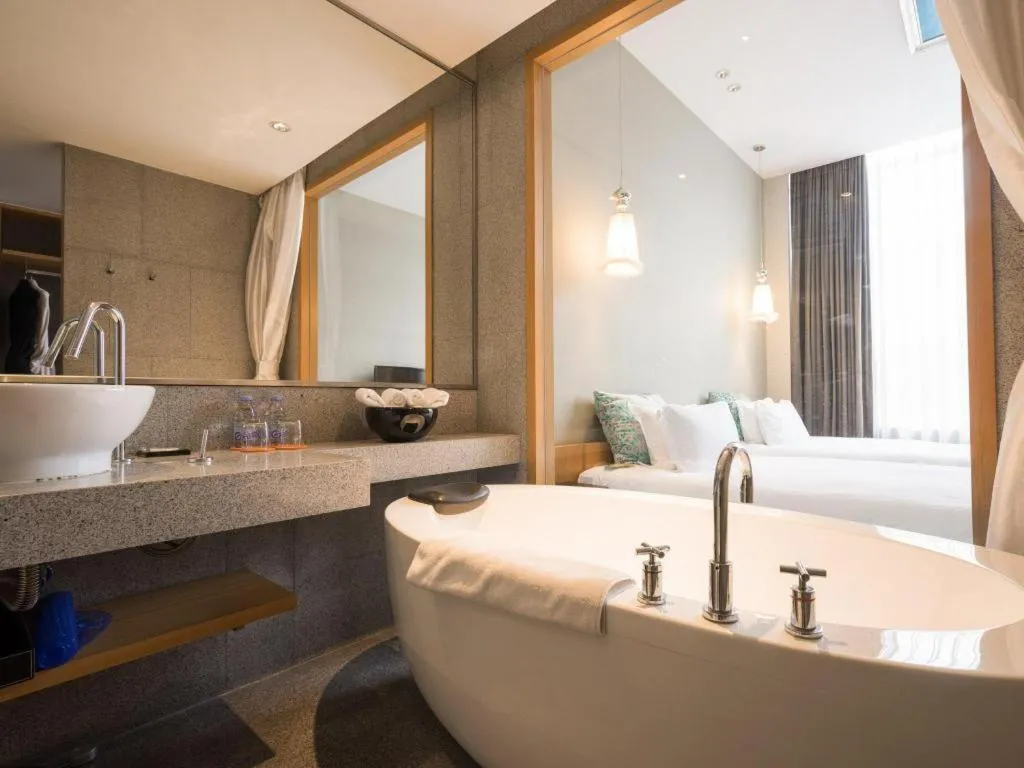 Bed in Guangzhou Carat Hotel