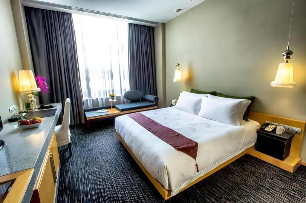 Bed in Guangzhou Carat Hotel