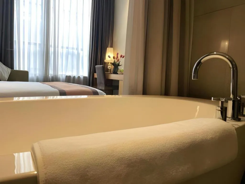 Bed in Guangzhou Carat Hotel