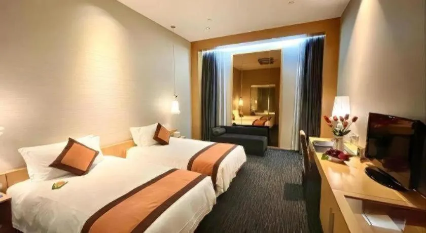 Bed in Guangzhou Carat Hotel