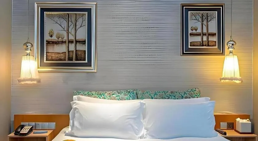 Bed in Guangzhou Carat Hotel