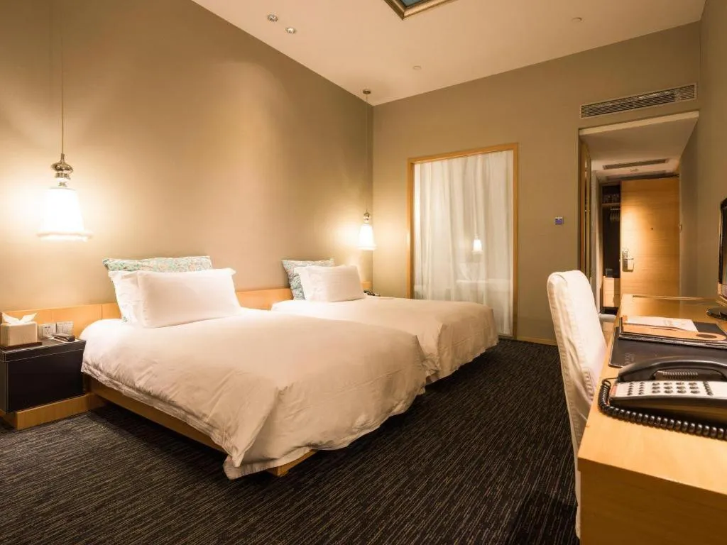 Bed in Guangzhou Carat Hotel