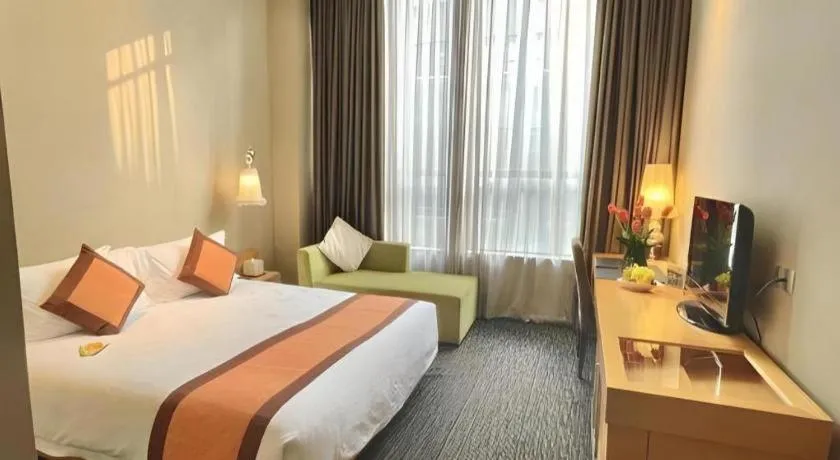 Bed in Guangzhou Carat Hotel