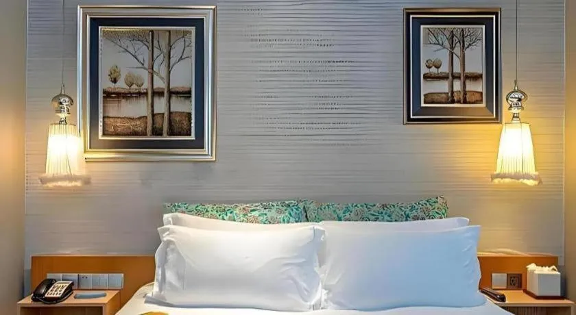 Bed in Guangzhou Carat Hotel