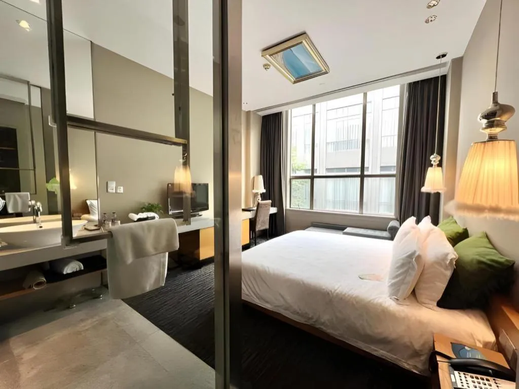 Bed in Guangzhou Carat Hotel