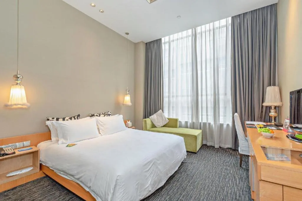 Bed in Guangzhou Carat Hotel