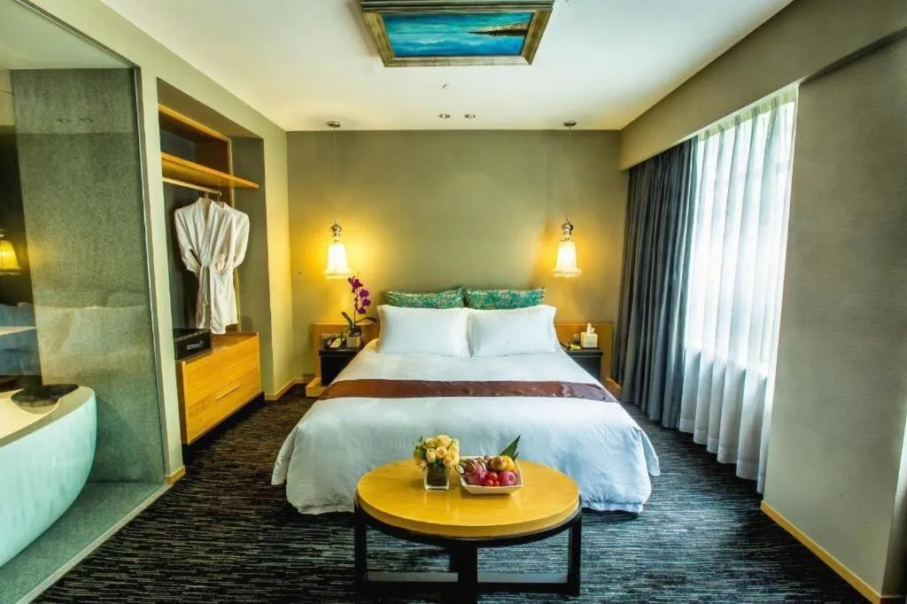 Bed in Guangzhou Carat Hotel