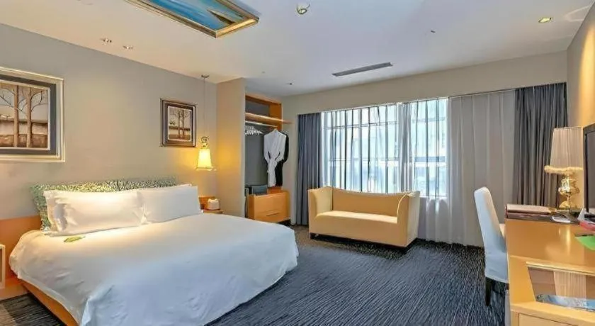 Bed in Guangzhou Carat Hotel