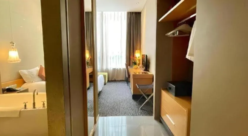 Bed in Guangzhou Carat Hotel