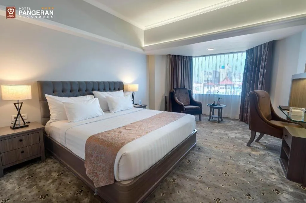 Bed in Hotel Pangeran