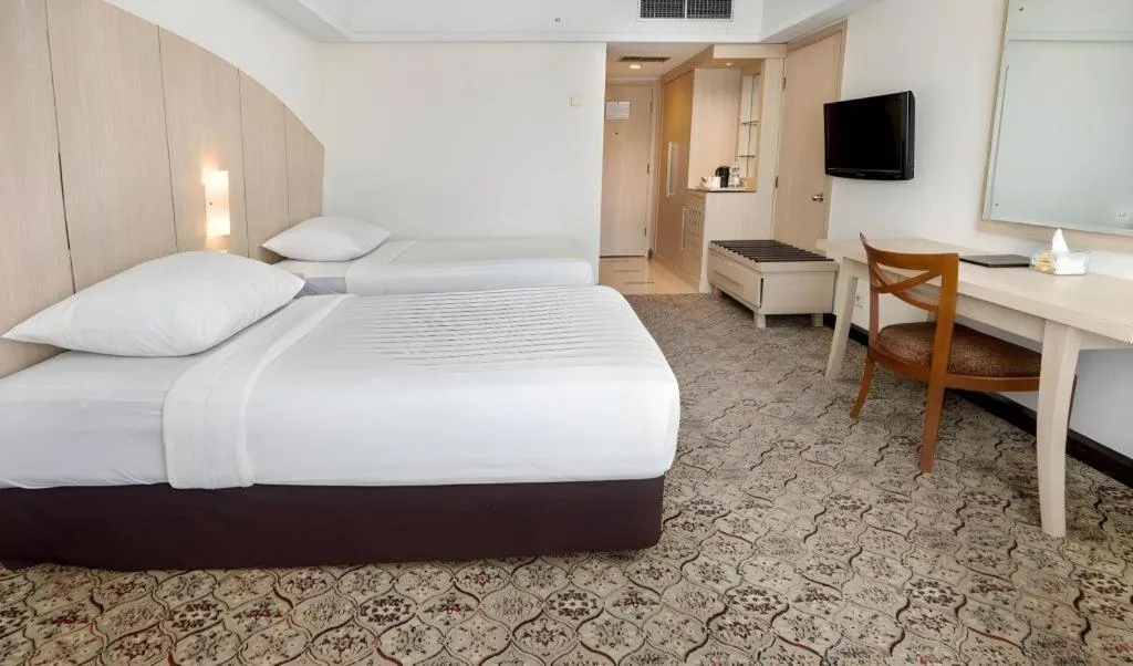 Bed in Hotel Pangeran