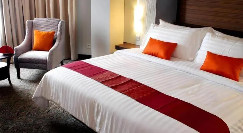 Bed in Hotel Pangeran