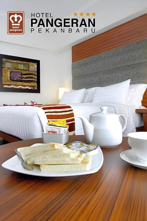 Bed in Hotel Pangeran