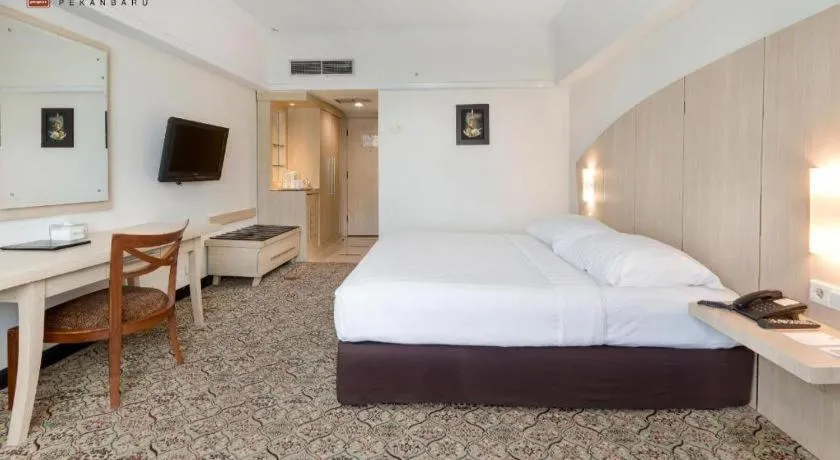 Bed in Hotel Pangeran