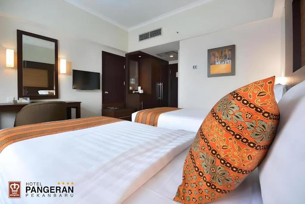Bed in Hotel Pangeran
