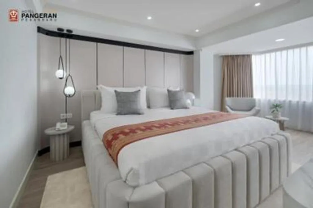 Bed in Hotel Pangeran