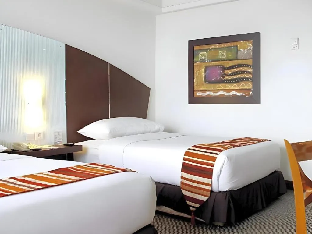 Bed in Hotel Pangeran