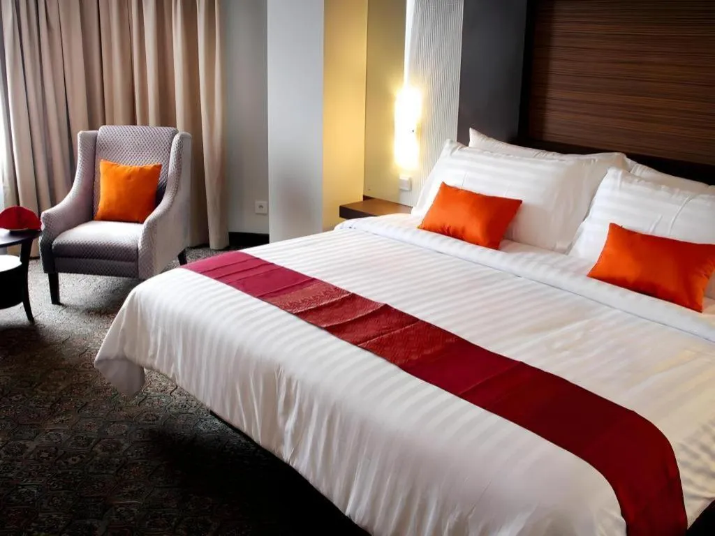 Bed in Hotel Pangeran