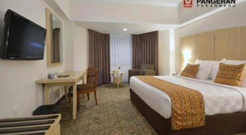 Bed in Hotel Pangeran