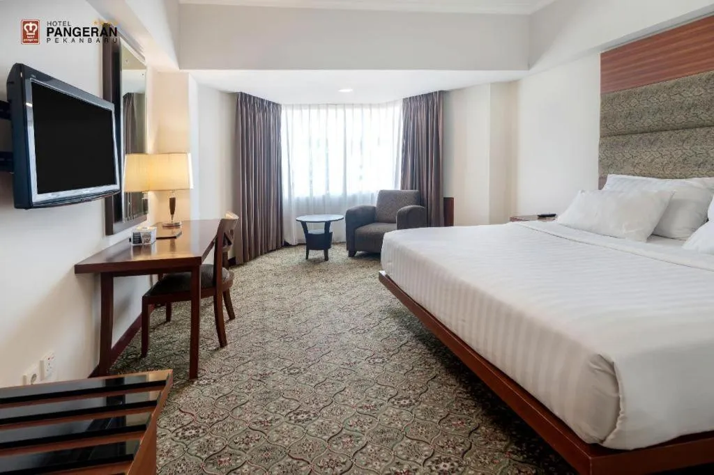 Bed in Hotel Pangeran