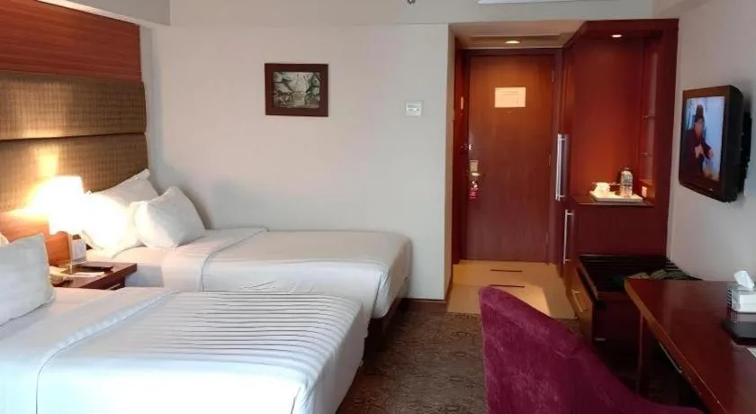 Bed in Hotel Pangeran