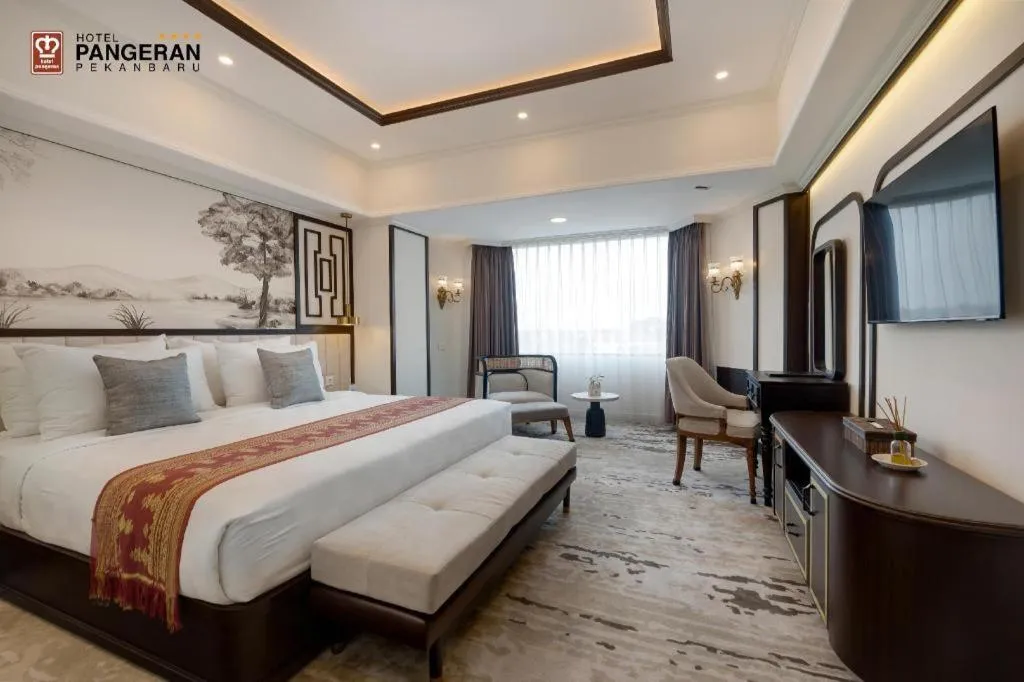 Bed in Hotel Pangeran