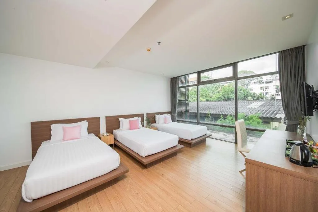 Bed in Seven Zea Chic Hotel