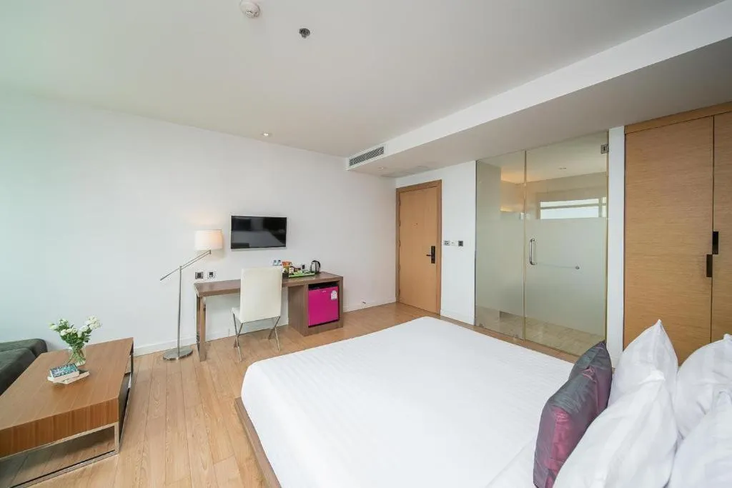 Bed in Seven Zea Chic Hotel