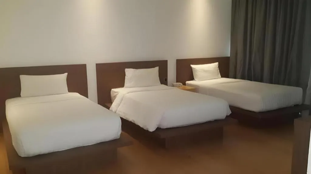 Bed in Seven Zea Chic Hotel