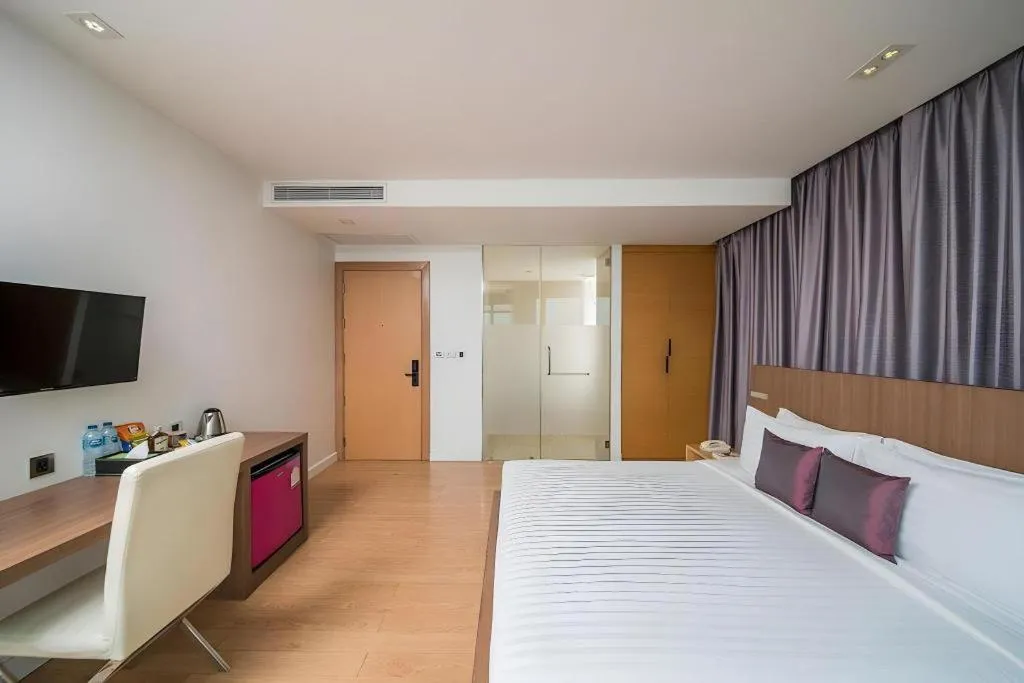 Bed in Seven Zea Chic Hotel