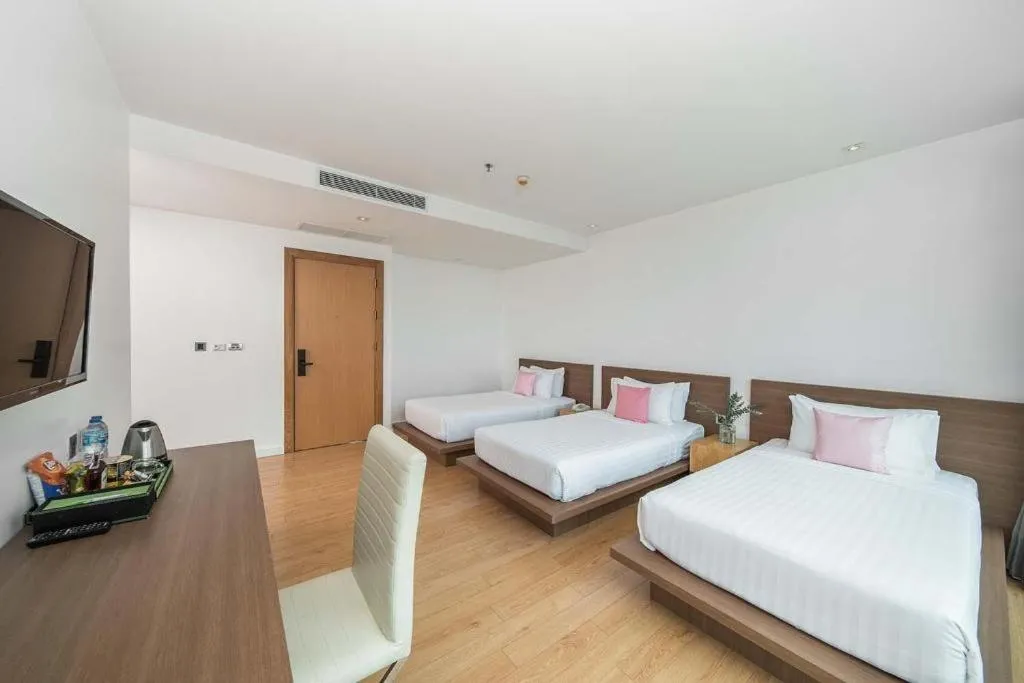 Bed in Seven Zea Chic Hotel