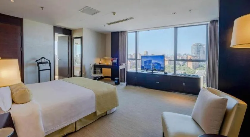 Bed in China National Convention Center Grand Hotel