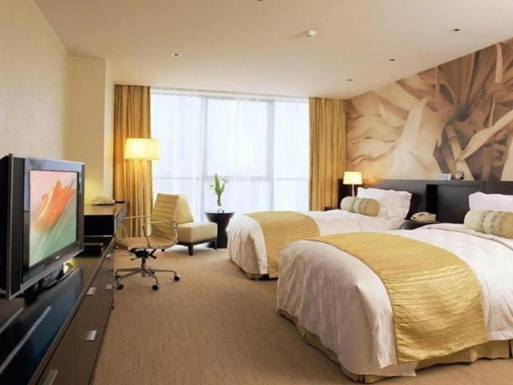 Bed in China National Convention Center Grand Hotel