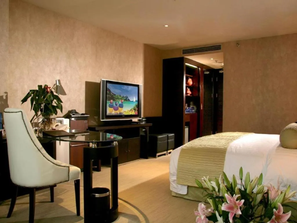 Bed in China National Convention Center Grand Hotel