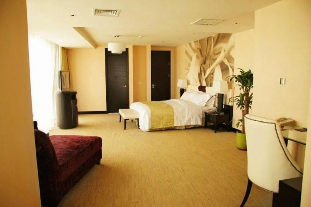 Bed in China National Convention Center Grand Hotel