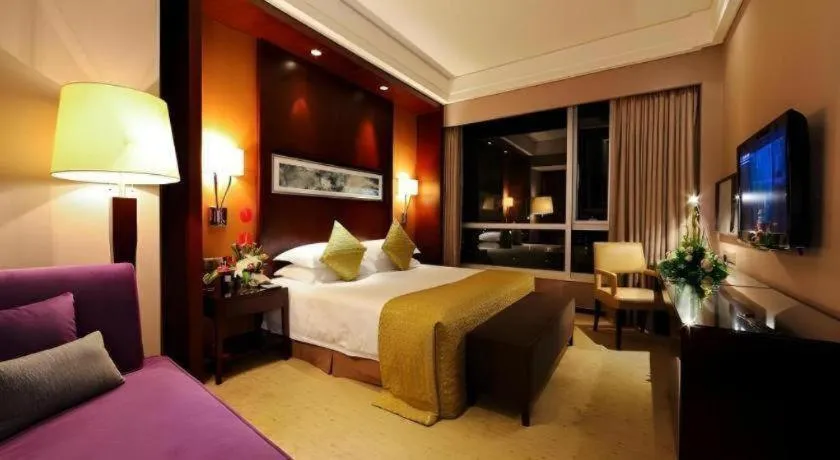 Bed in Kinho Narada Hotel