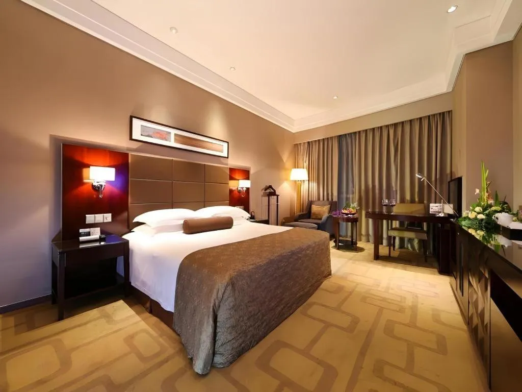 Bed in Kinho Narada Hotel