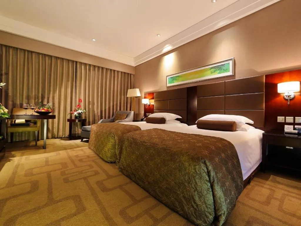 Bed in Kinho Narada Hotel