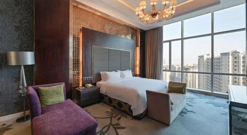 Bed in Kinho Narada Hotel