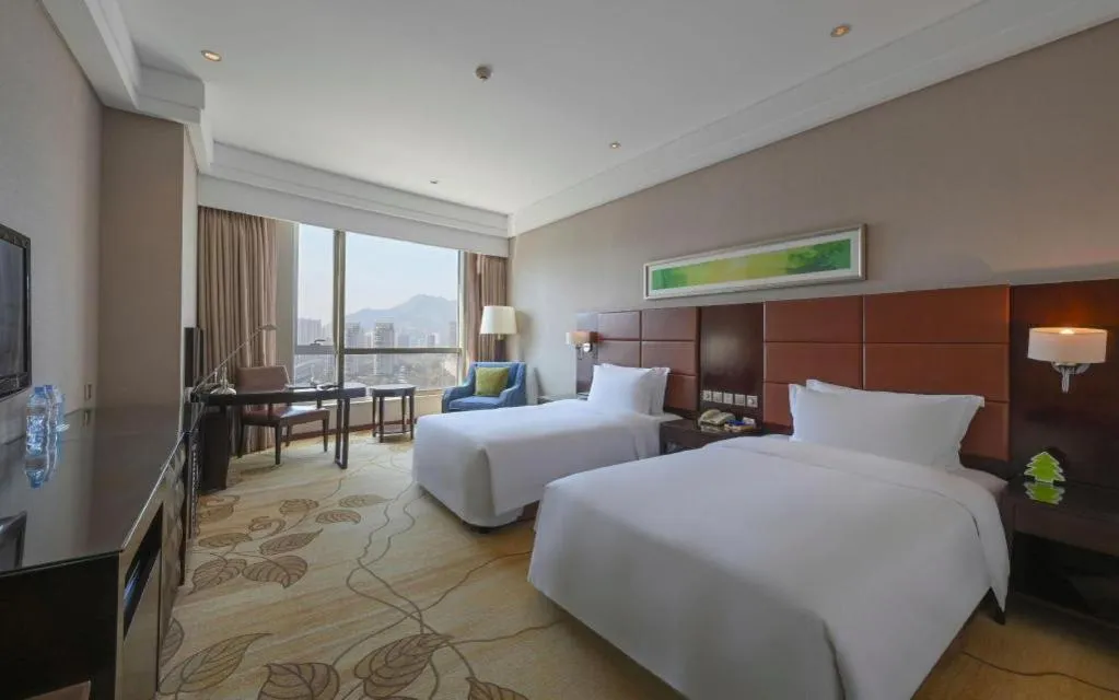 Bed in Kinho Narada Hotel