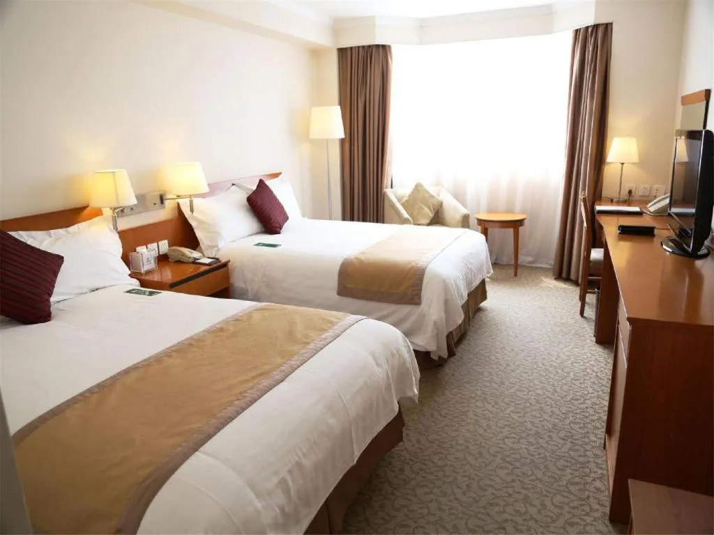 Bed in Jinglun Hotel