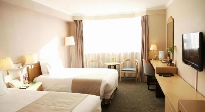 Bed in Jinglun Hotel