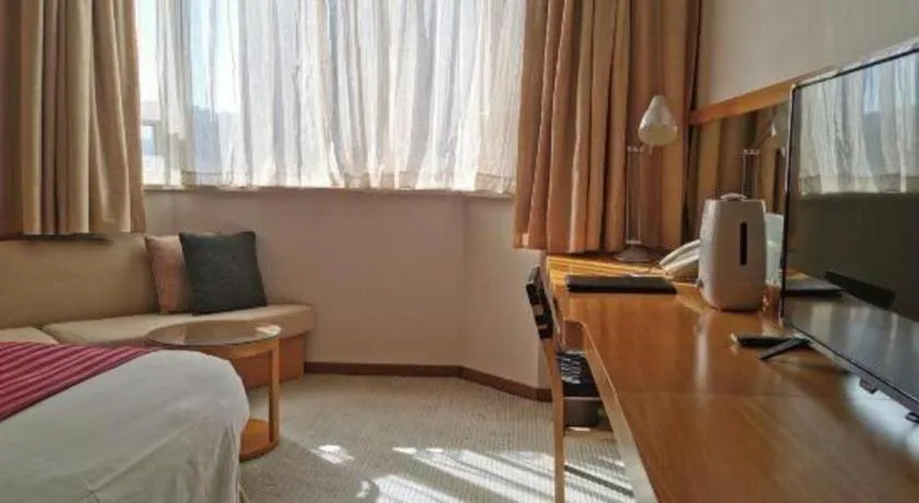 Bed in Jinglun Hotel