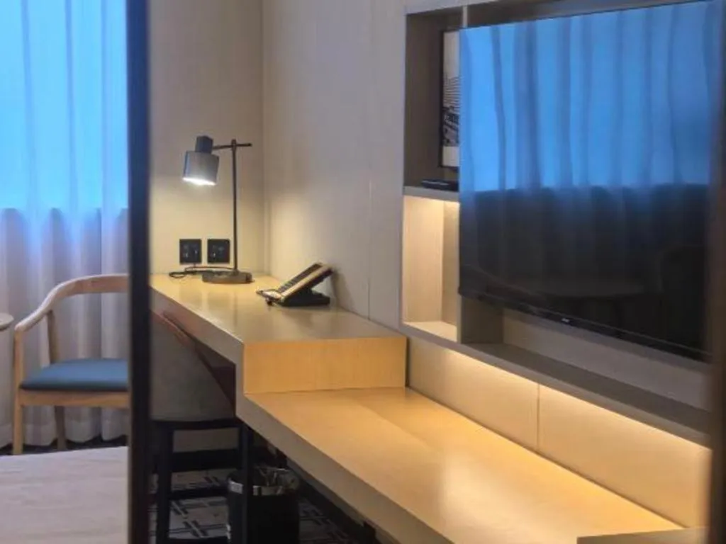 Bed in Jinglun Hotel