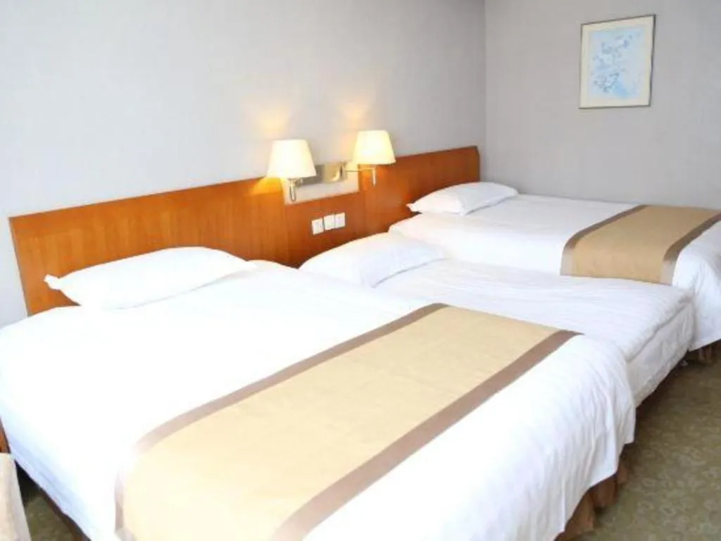 Bed in Jinglun Hotel