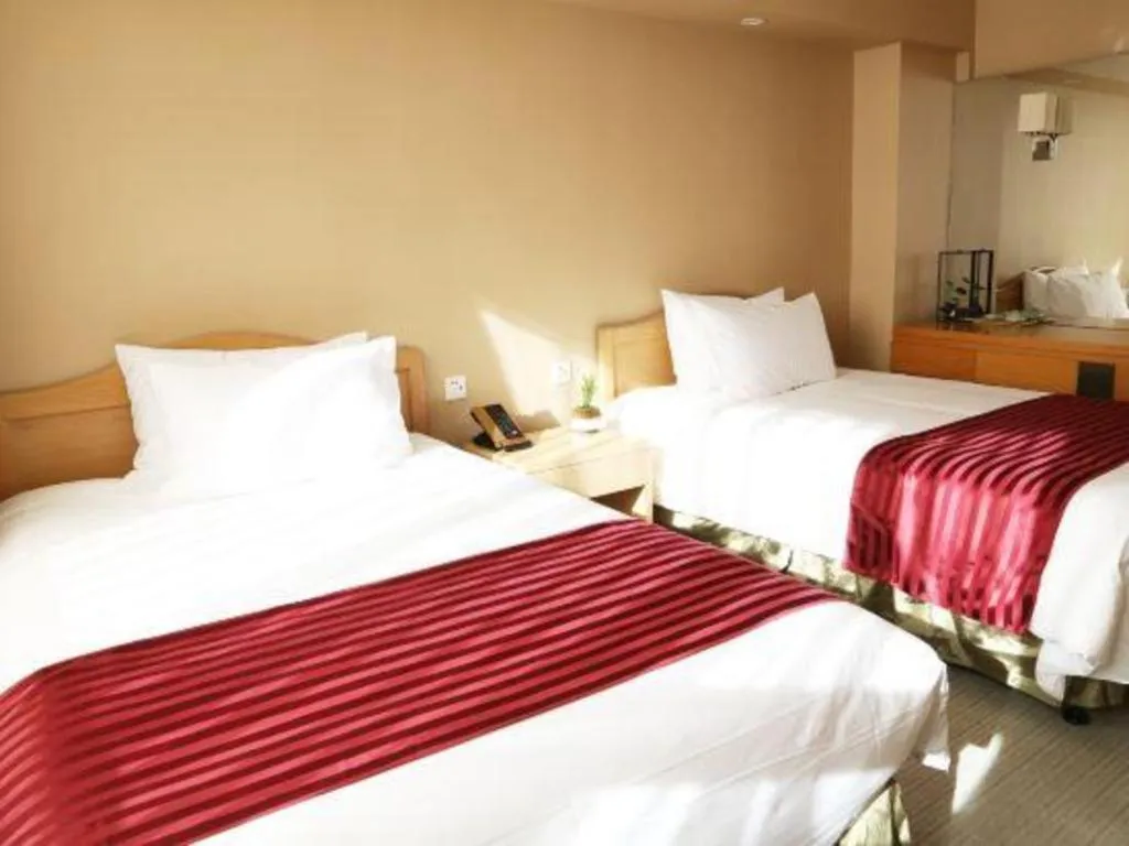 Bed in Jinglun Hotel