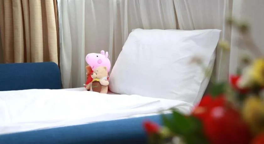 Bed in Jinglun Hotel