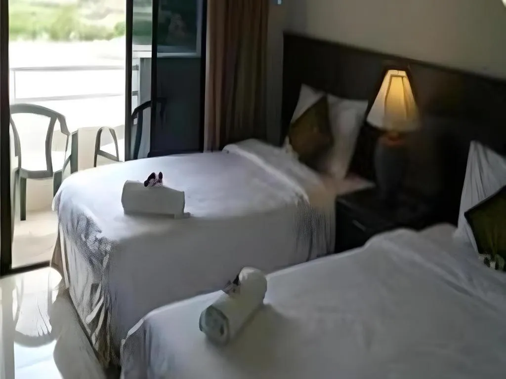 Bed in Kamala Phuyai Resort